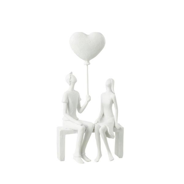 Statuette couple assis sur banc et ballon cœur